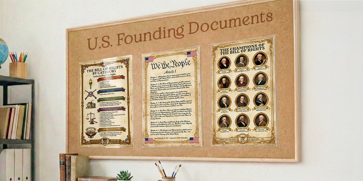 Three laminated U.S. founding document posters displayed together on a classroom board